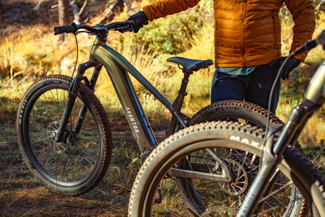 Aventon Ramblas, one of the best tubeless tire electric mountain bikes for sale, displayed in CyclErie’s ebike shop in Erie, CO.