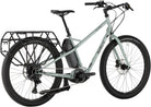 Compact Surly Skid Loader electric cargo bike with steel frame, parked in urban alley.