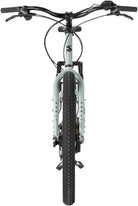 Surly Skid Loader electric bike with 27.5" tires, hauling gear on trail.