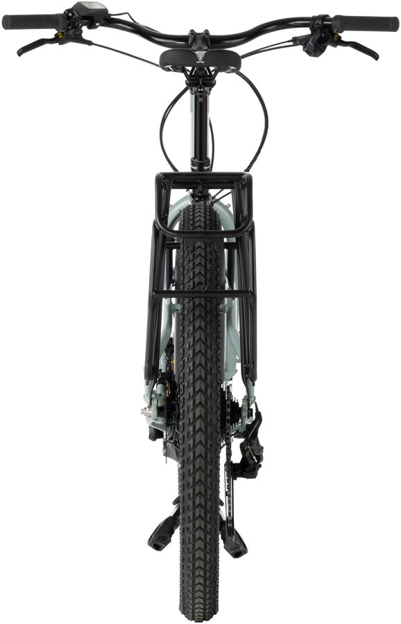 Bosch-powered Surly Skid Loader cargo bike navigating tight urban spaces.