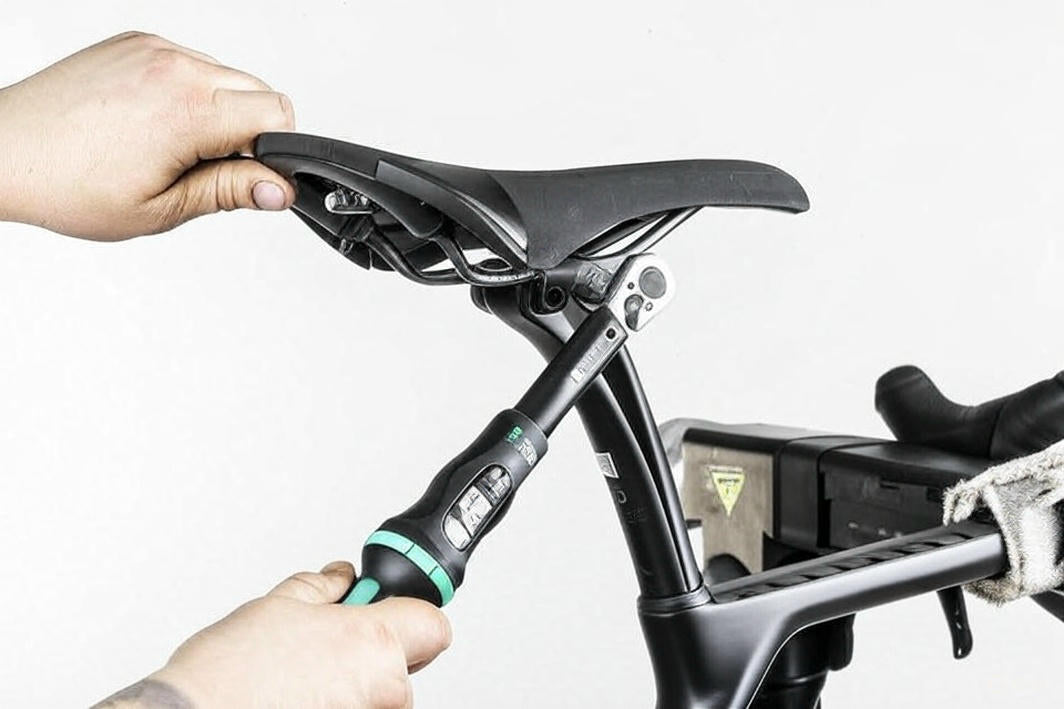 CyclErie technician assembling a Canyon bike in Erie, CO shop for the 2025 box build service