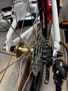 Red Woom 4 Original, scuffed fork/frame, chain in top shape.