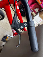 Red Woom 4 Original, scuffed fork/frame, chain in top shape.