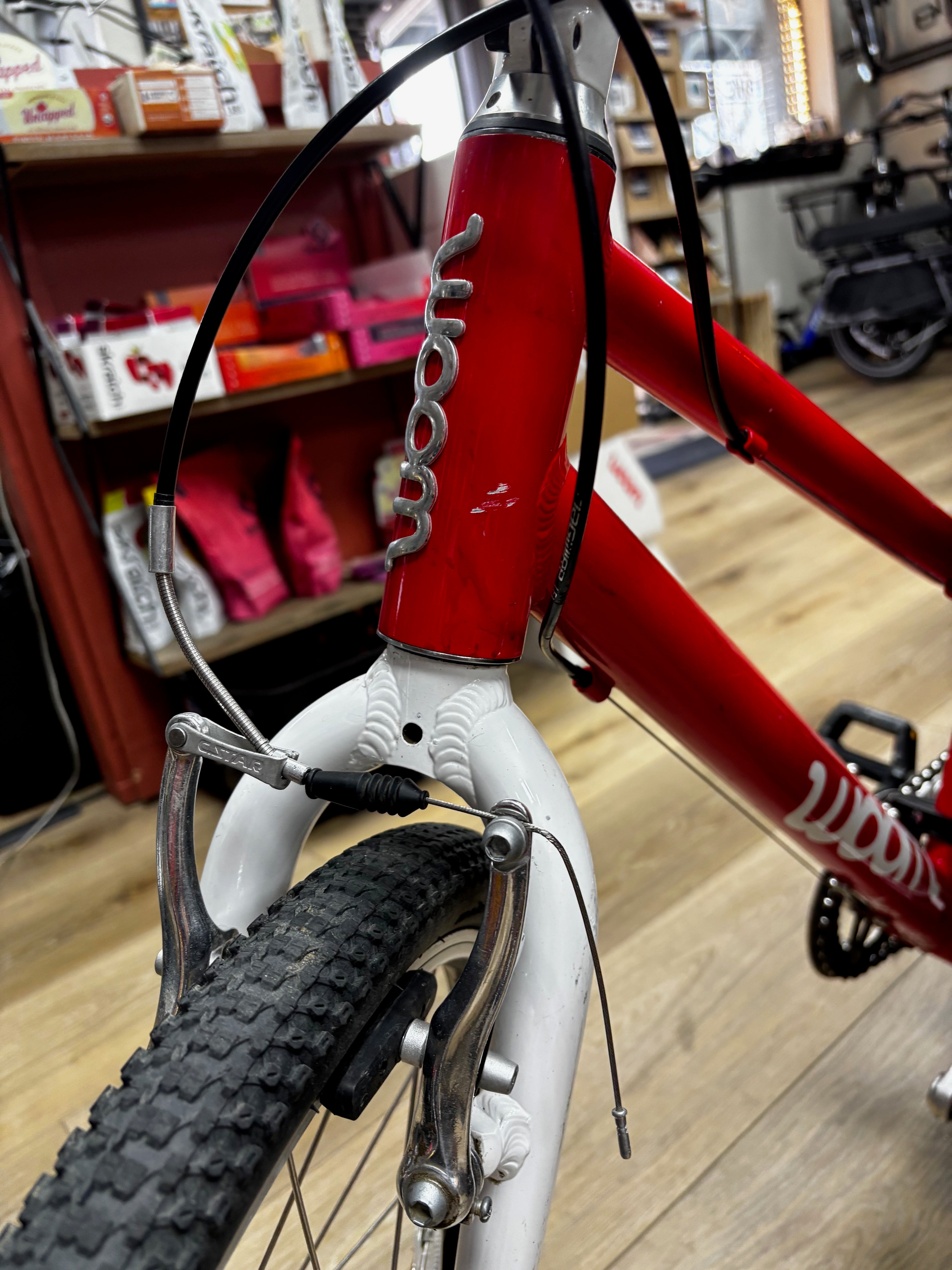 Woom 4 Original, red, heavy frame scuffs, chain works perfectly.