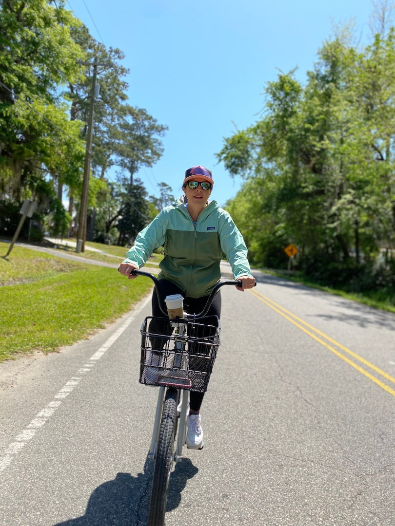Woman Riding eBIke and Beautifil Spring Day