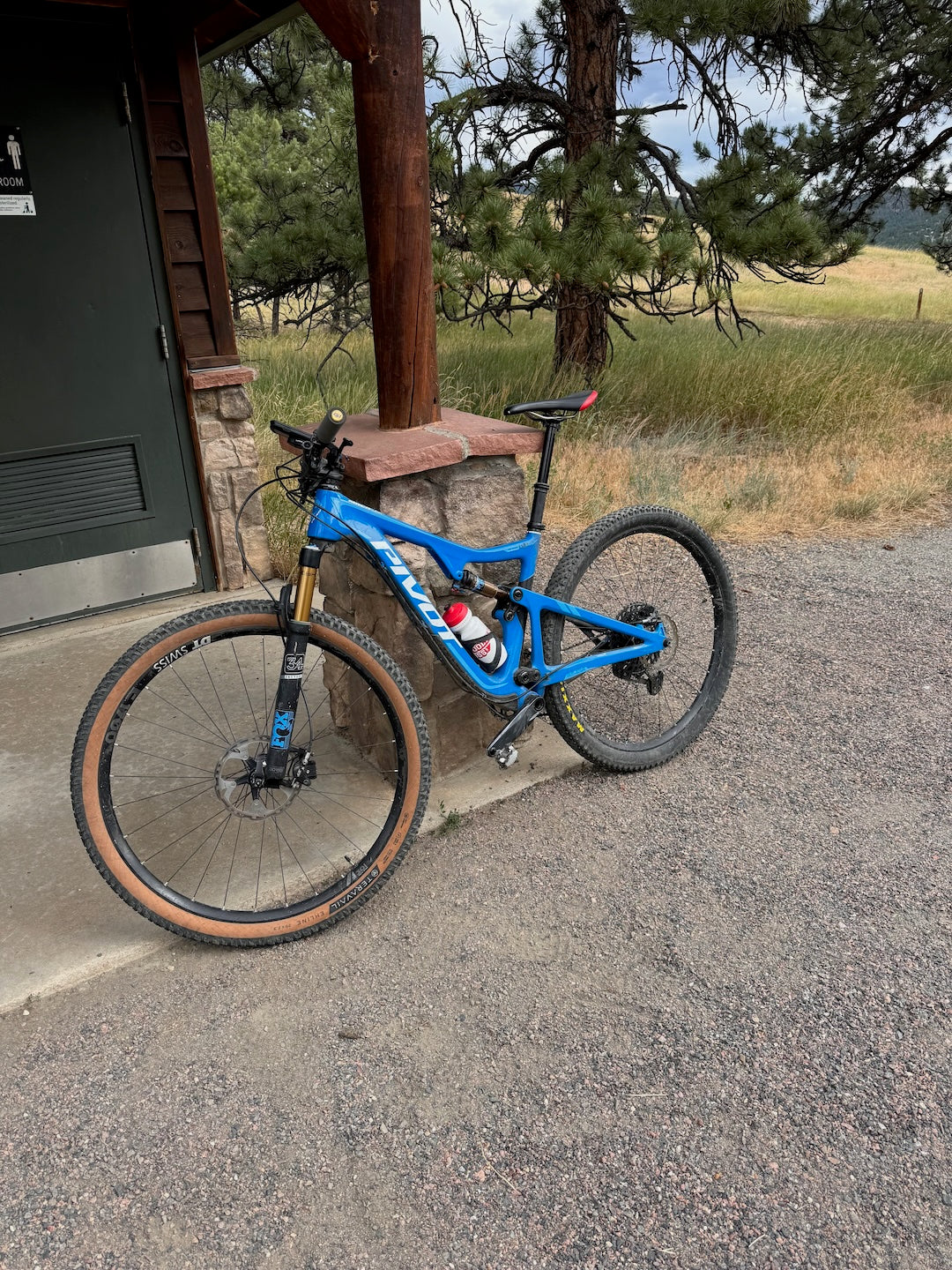 Mountain Bike leaning against wall at Betasso Preserve Open Space trail in Boulder