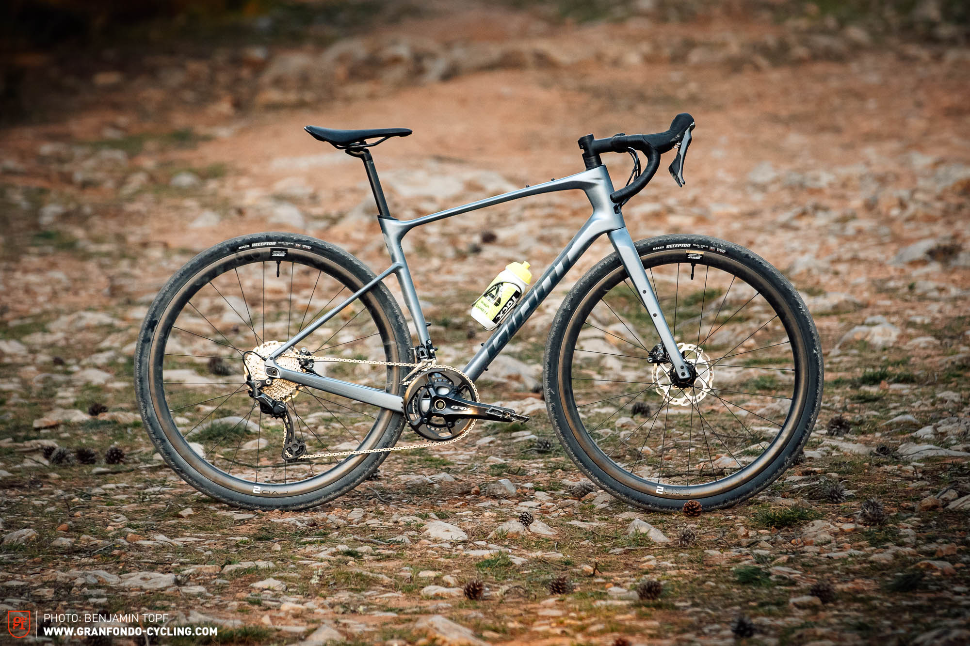 Photo of a Giant branded Gravel Bike on a rocky path