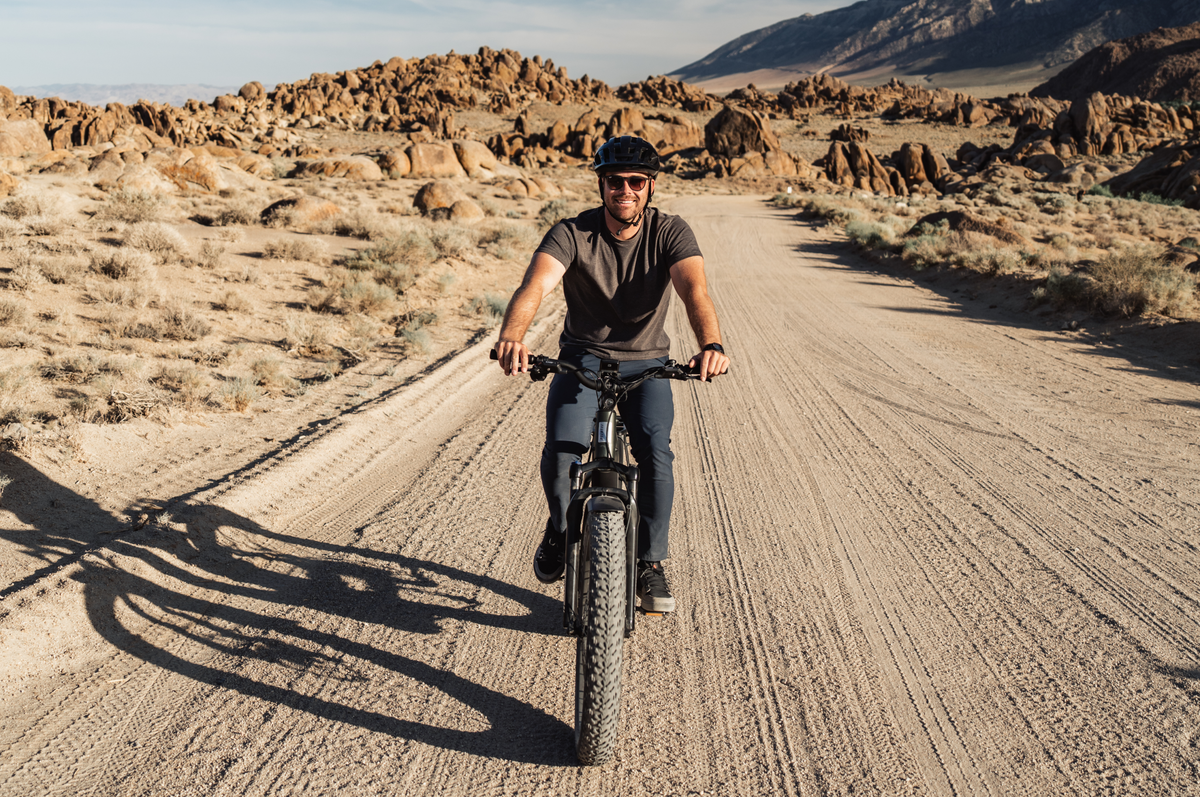 Aventon Aventure M mid-drive fat tire ebike lifestyle photo, available at CyclErie in Erie, CO.