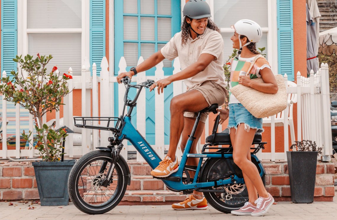 Rider on the Aventon Abound SR cargo ebike, available at CyclErie in Erie, CO.