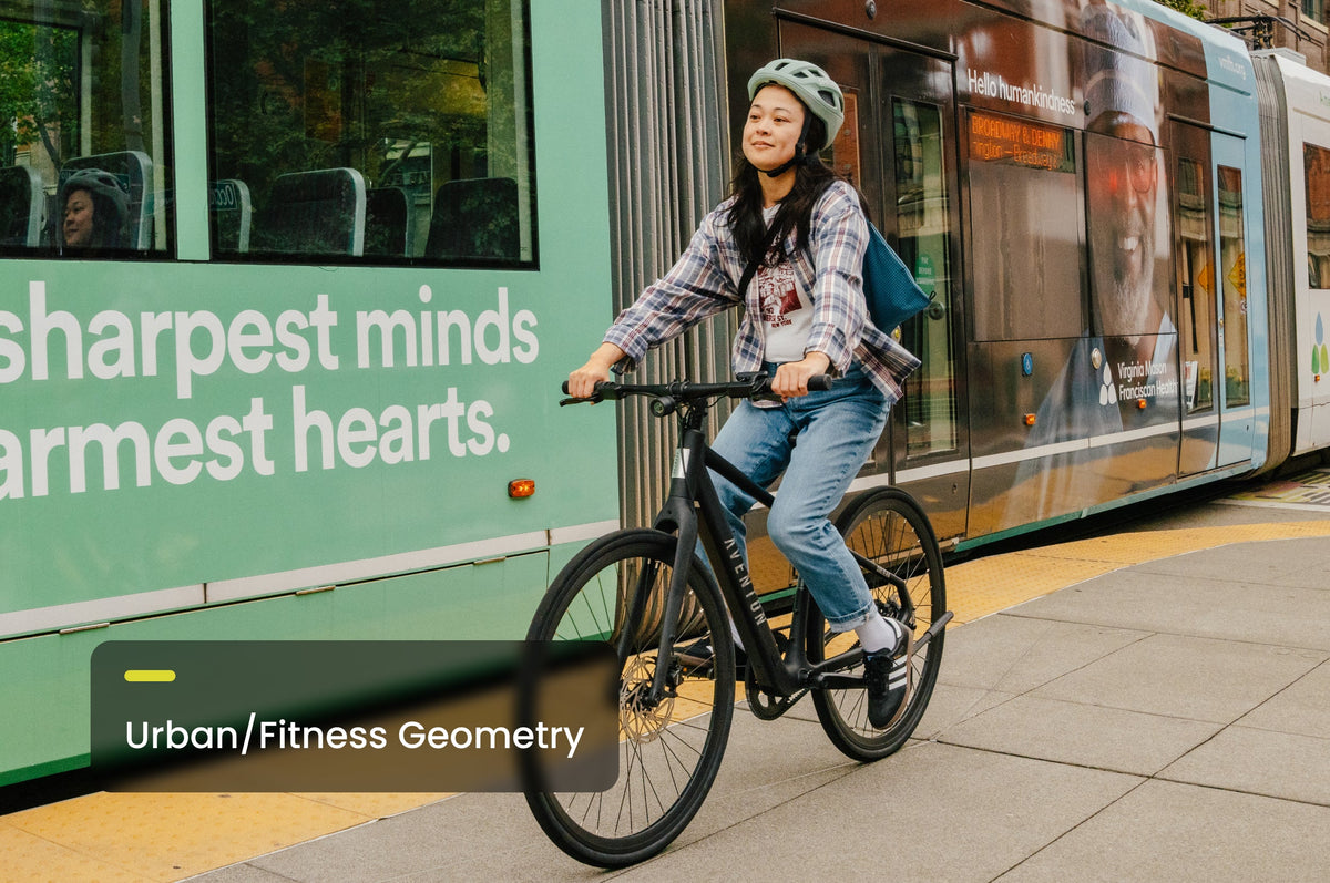 Rider on the Aventon Soltera 3 ADV belt drive ebike in the city, available at CyclErie in Erie, CO.